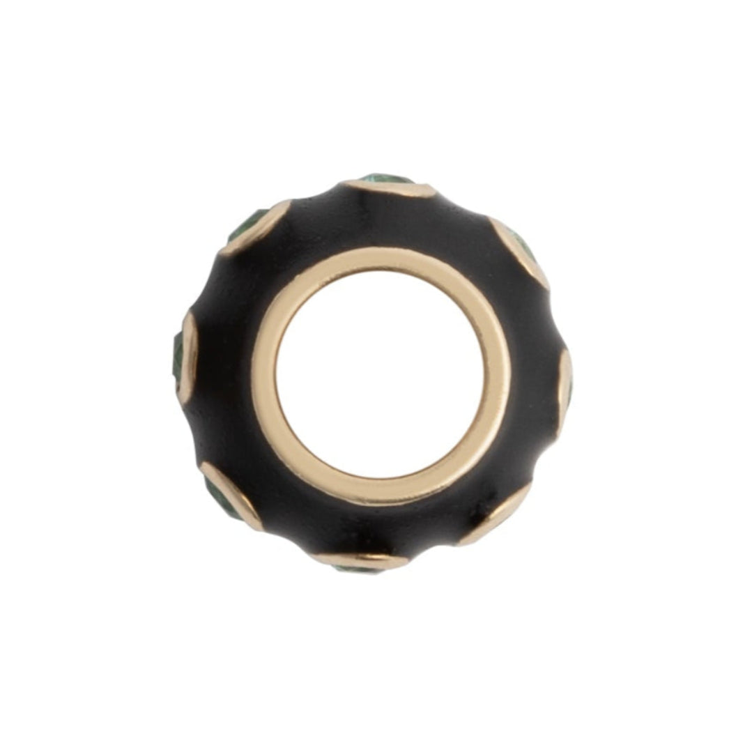 Black and gold bead on a white background