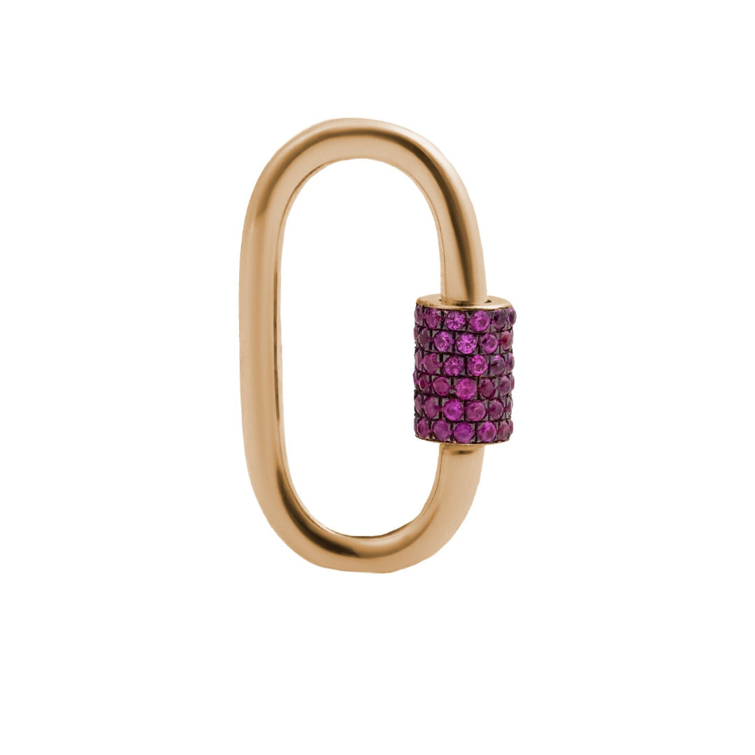 A gold-colored carabiner with a pink sapphire screw lock