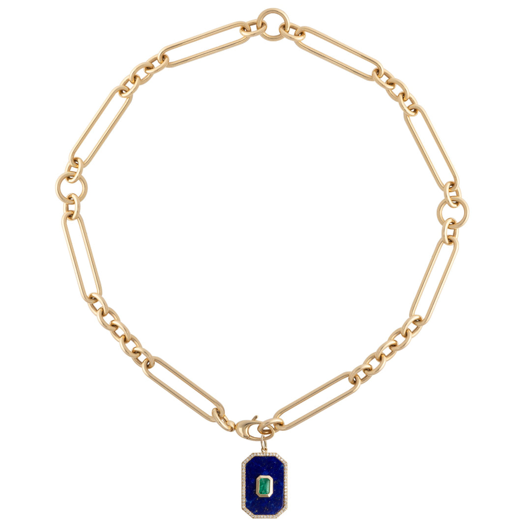A 14k gold chunky mixed link chain with a lapis and emerald pendant on a white background.