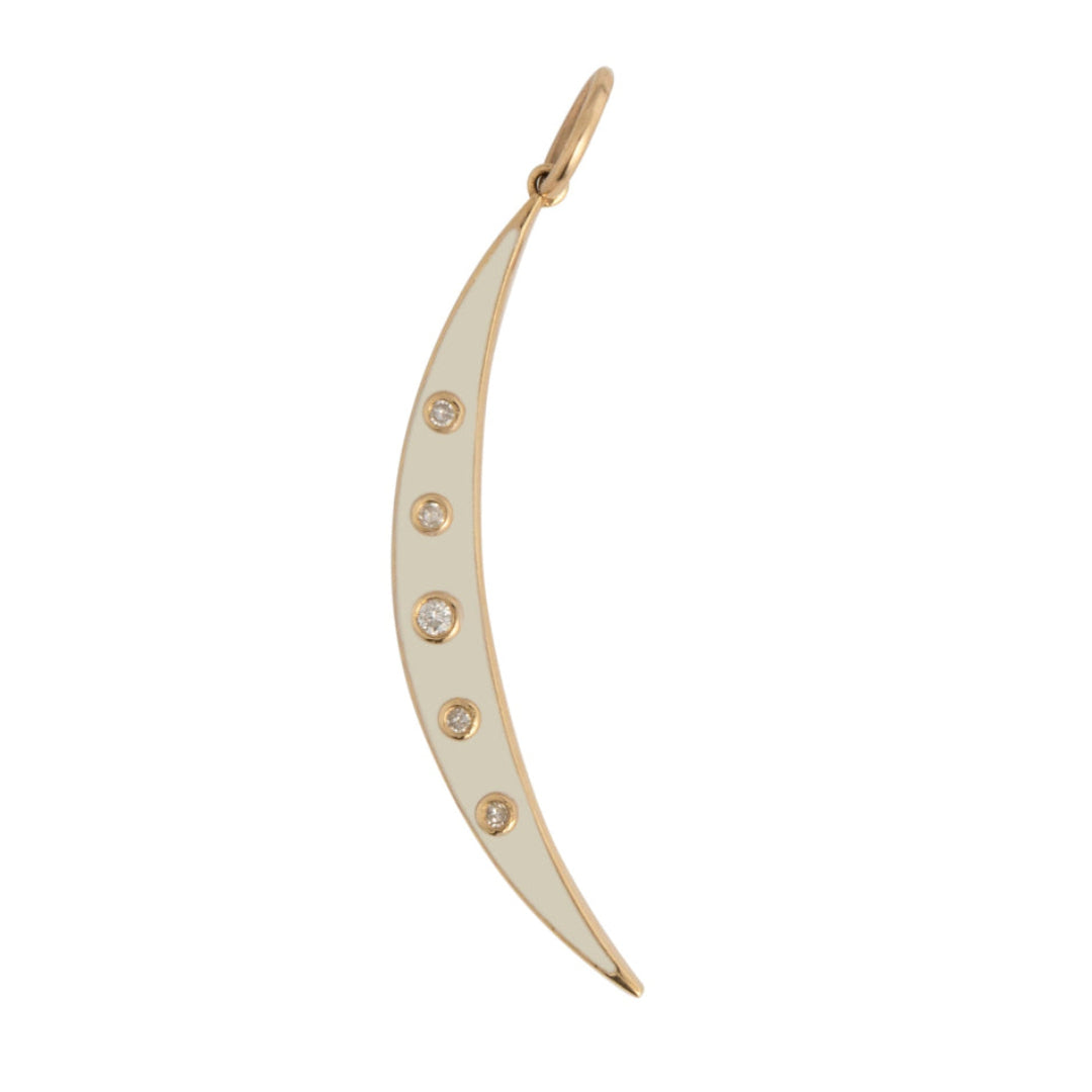 A gold crescent moon-shaped pendant with white enamel detailing and small diamonds around the edge.