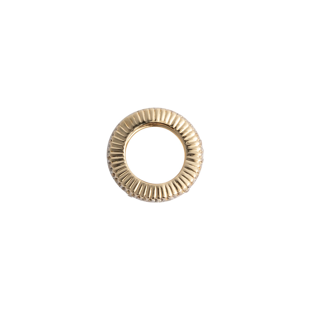 A sideways view of a 14k gold roundel bead.