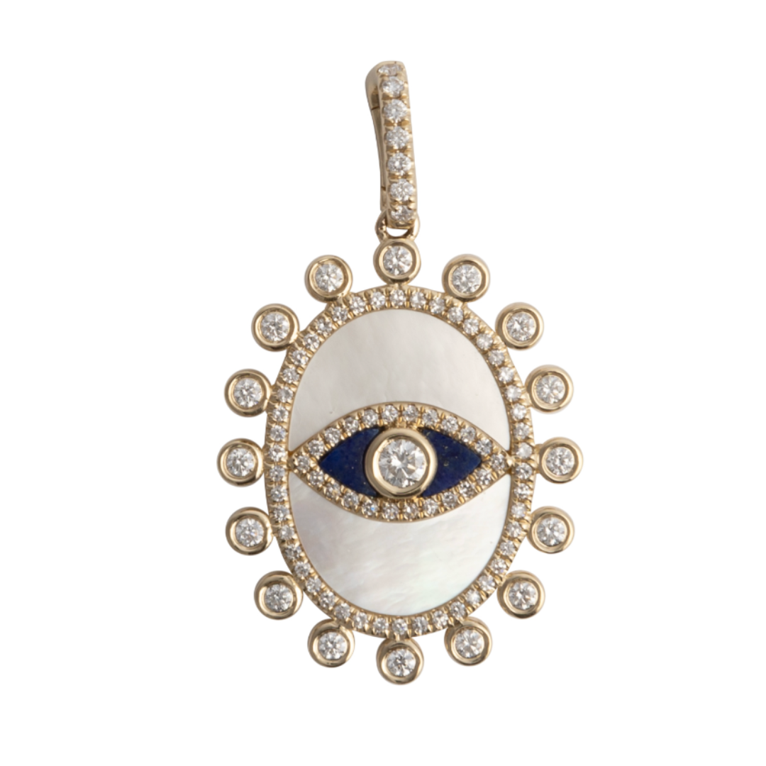 A 14k gold pendant featuring a mother of pearl and lapis center with a surrounded by a row of sparkling diamonds, with a built-in clip for attaching to a chain.