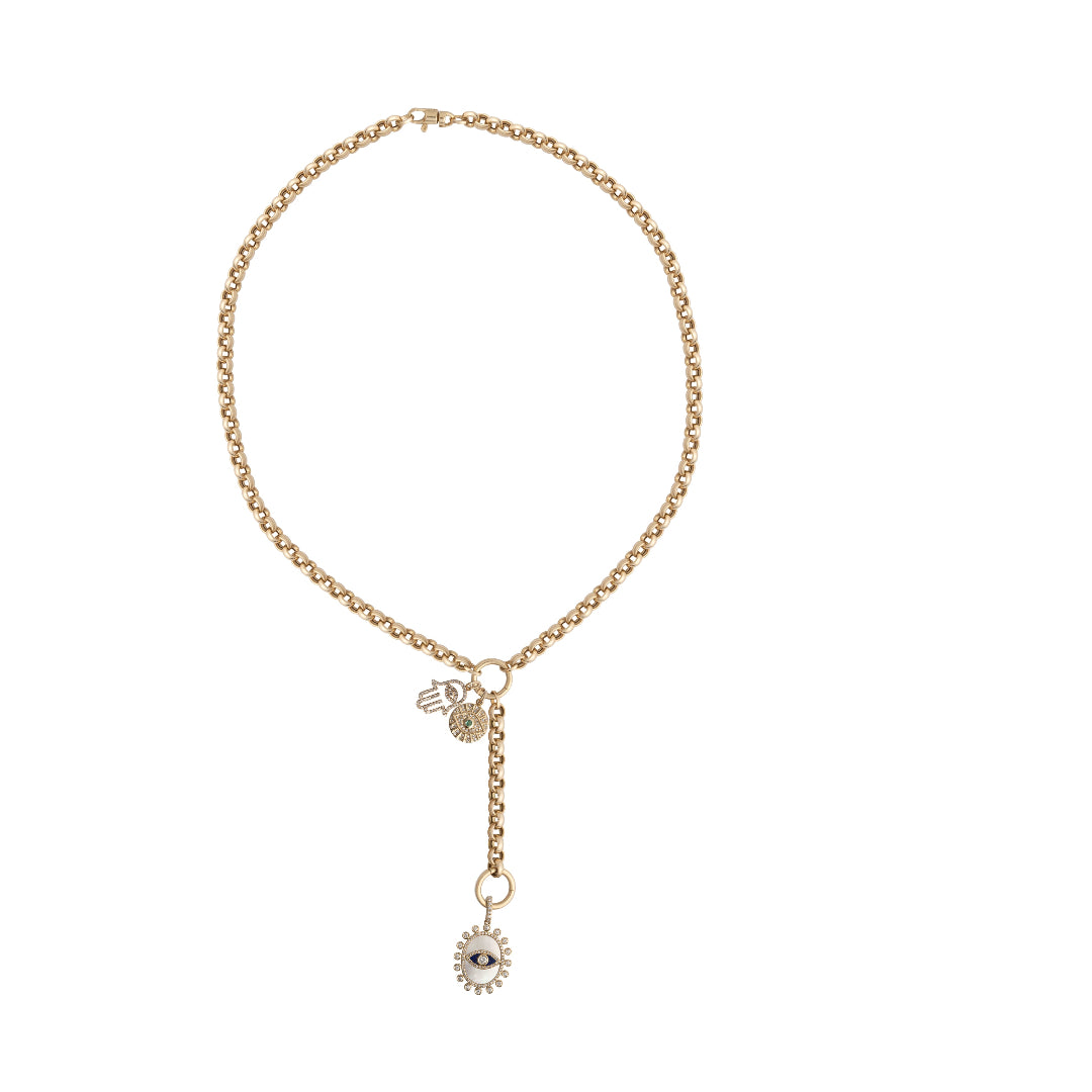 A rolo link lariat chain with three pendants attached, set on a white background.