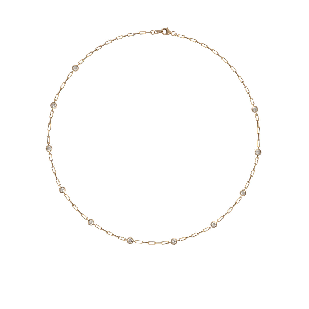 A gold-colored chain necklace featuring a series of round diamond stations attached to a central link.