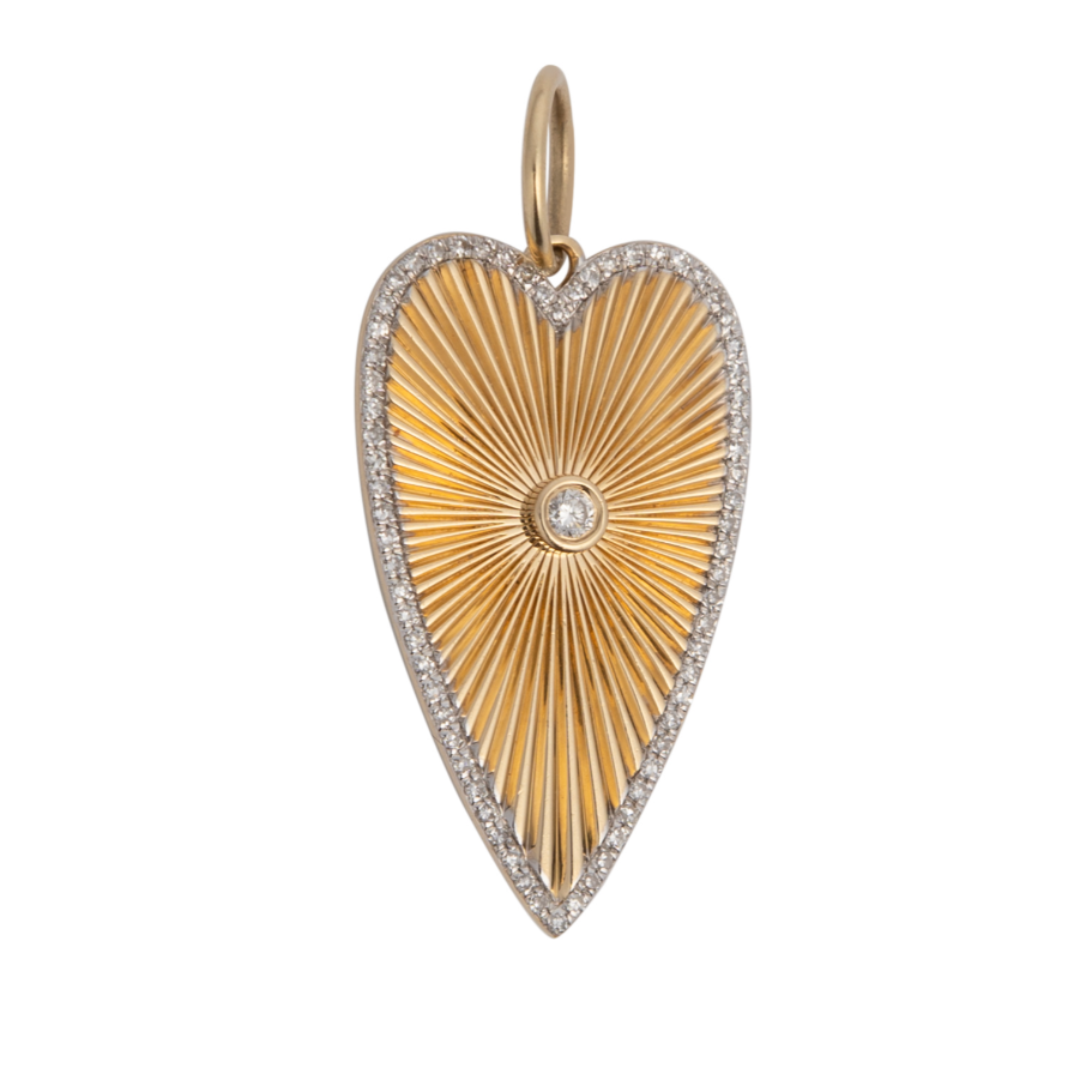 A gold heart-shaped pendant adorned with diamonds.