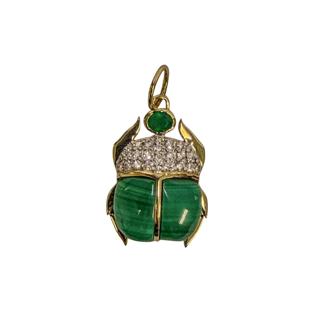 A scarab pendant set in 14k gold featuring malachite, diamond pavé and green onyx on a white background.
