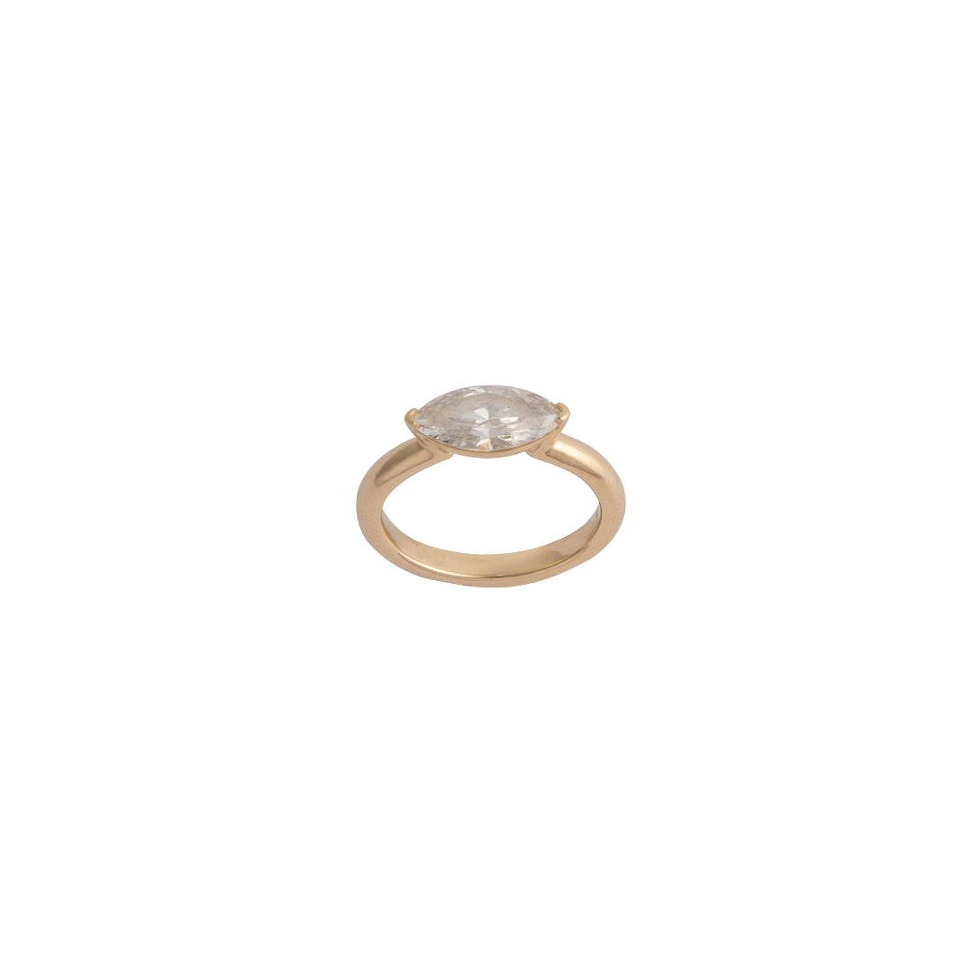 Gold ring with a diamond on a white background