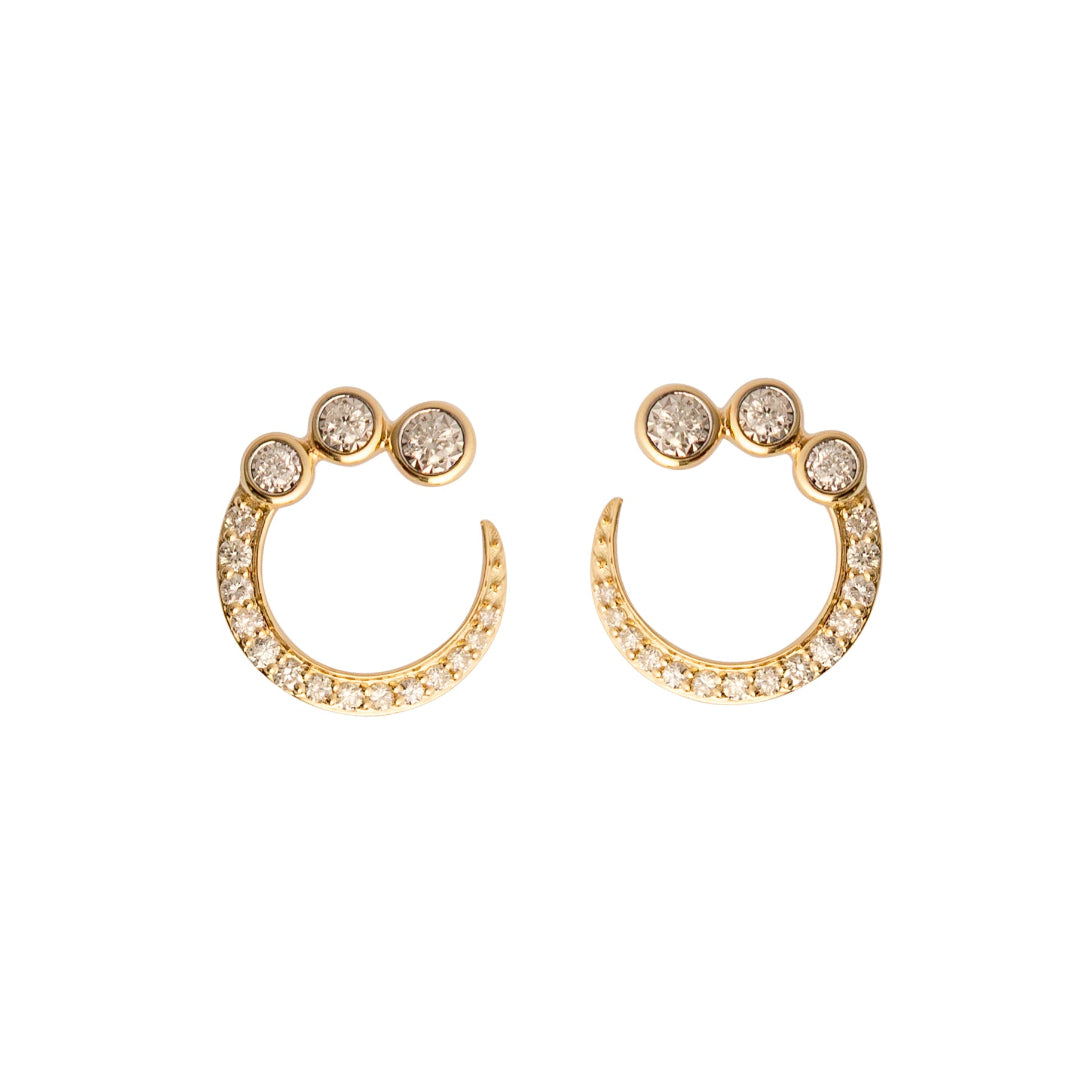 Gold stud earrings with small diamonds on a white background.