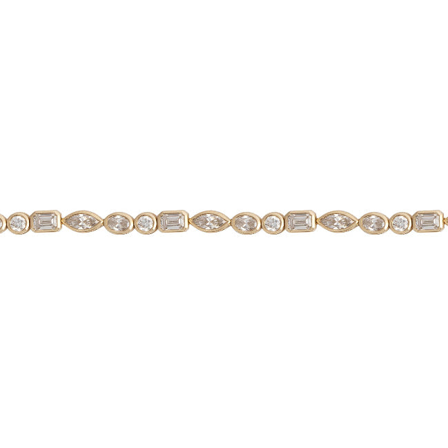 A tennis bracelet with lab-grown diamonds bezel set in 14k gold, featuring a series of connected gold circles with diamond accents.