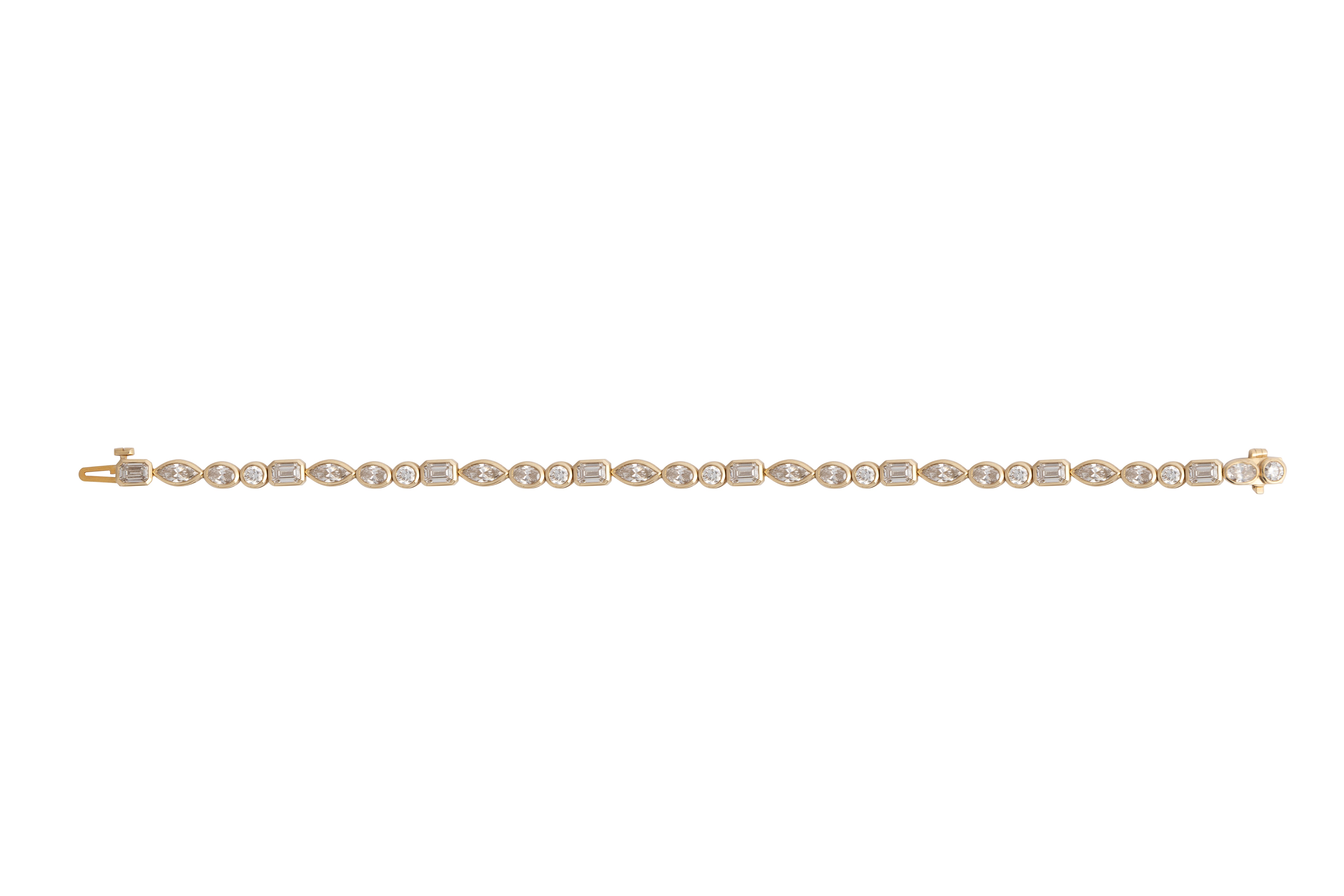 A lab-grown diamond tennis bracelet with multi-shaped, bezel-set diamonds. Set in 14k gold against a white background.