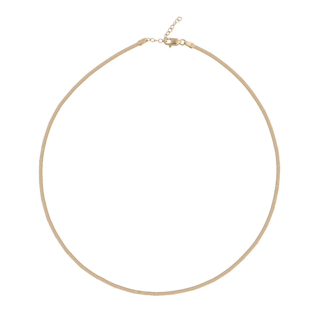 Gold necklace on a white background