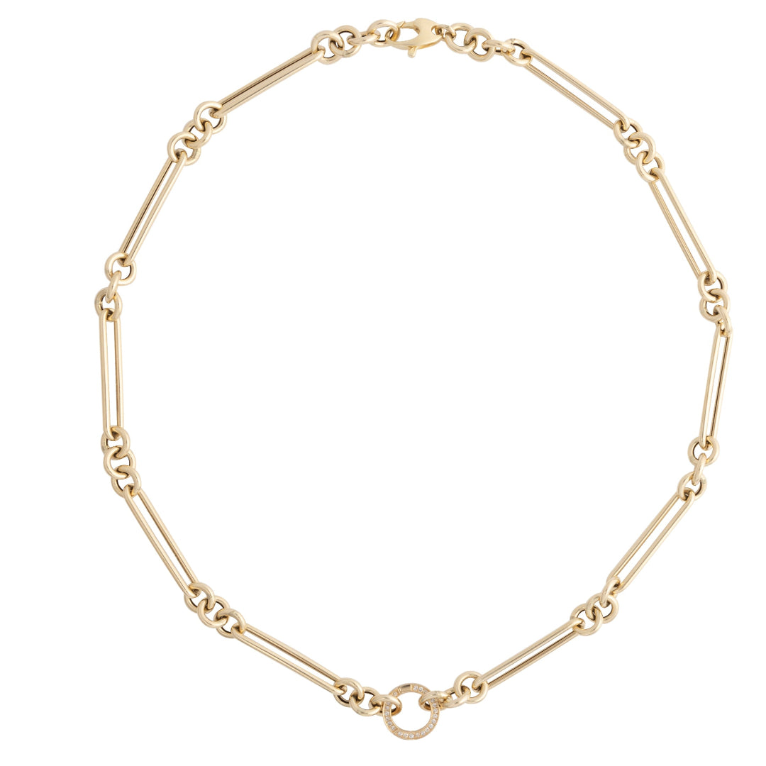 A 14k gold necklace with a double-sided diamond enhancer, featuring oval and round link chains.