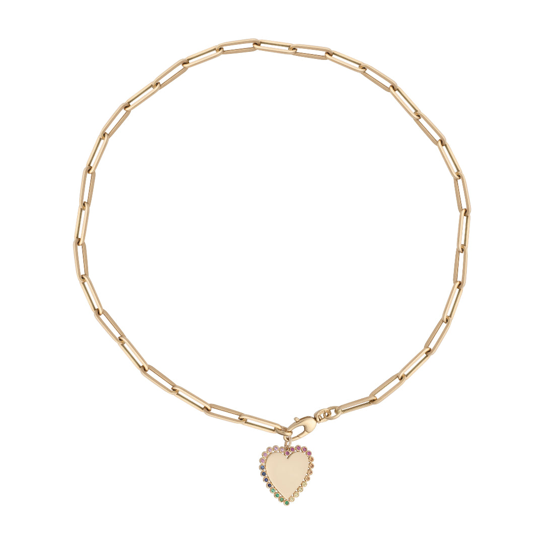 A gold paperclip chain with a heart pendant with a boarder of multi-colored sapphires.