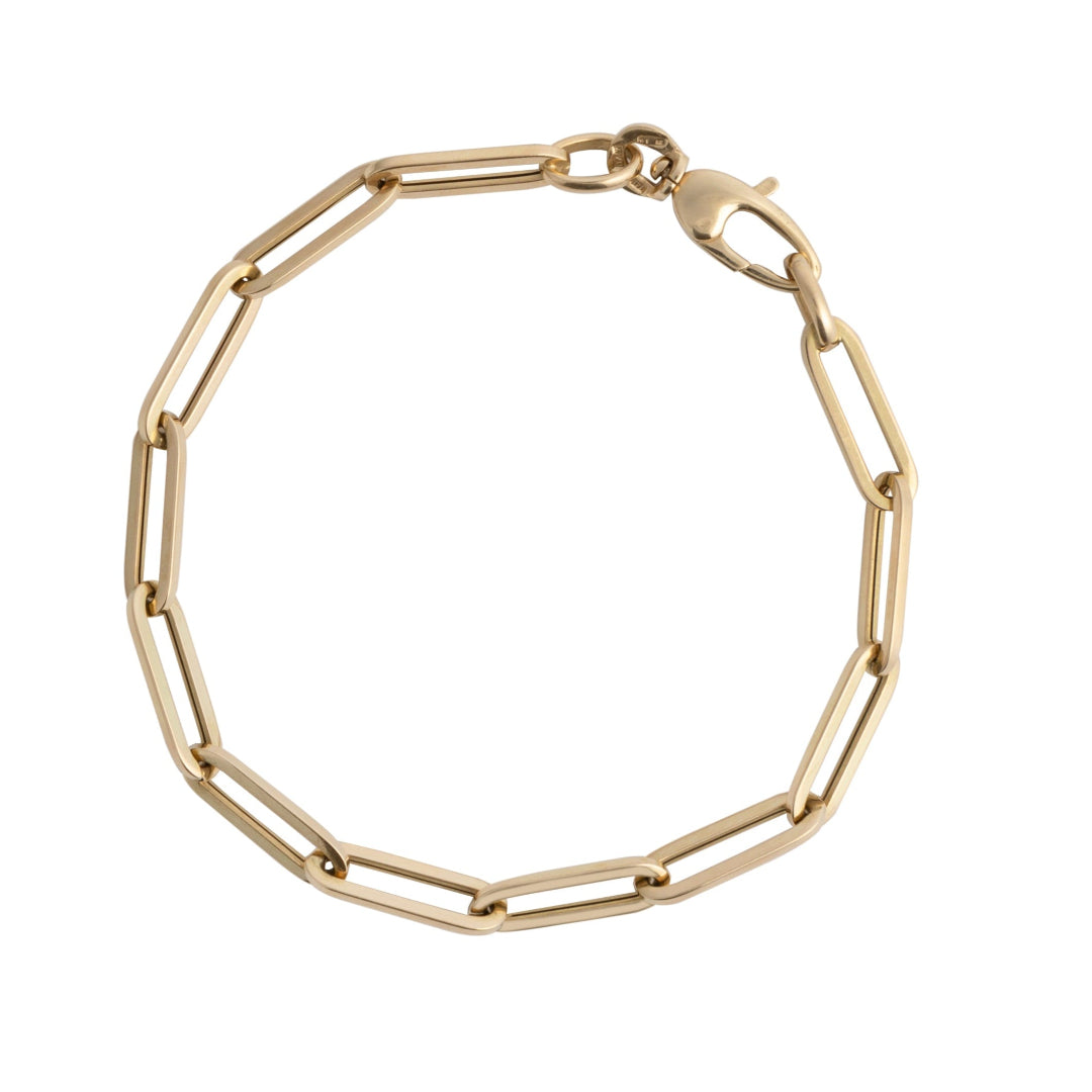 A 14k gold Paperclip Chain Bracelet with small link chains and a lobster clasp closure.