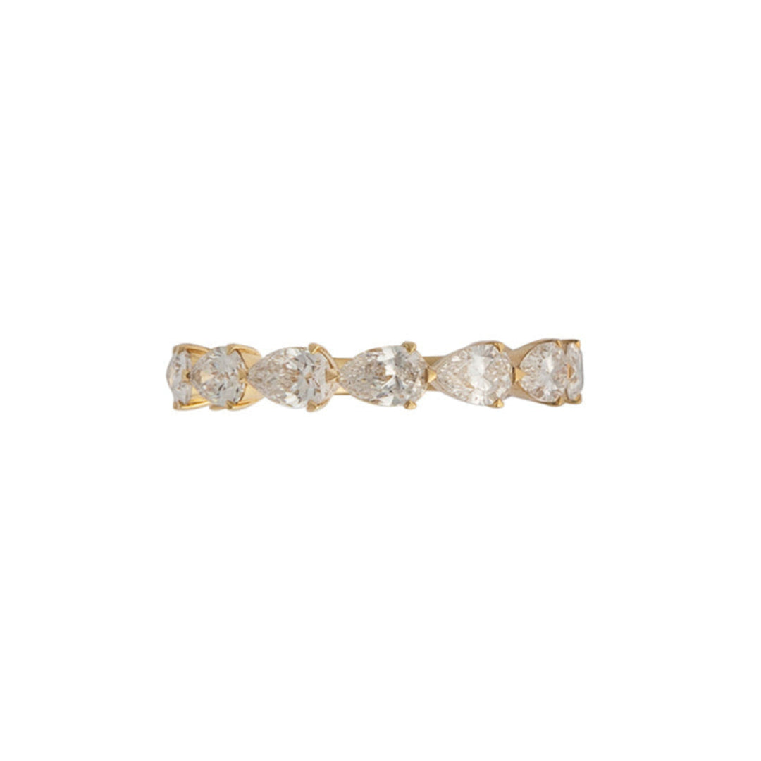 A band ring with pear cut lab-grown diamonds set in 18k gold, with the diamonds covering 3/4 of the band's length.