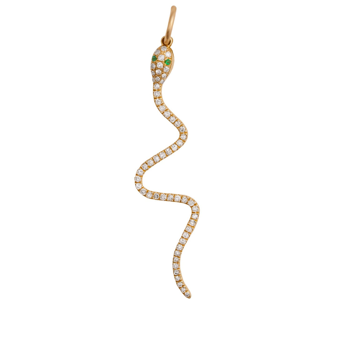 A gold-colored serpent-shaped pendant adorned with diamonds, with emerald or pink sapphire eyes, against a white background.