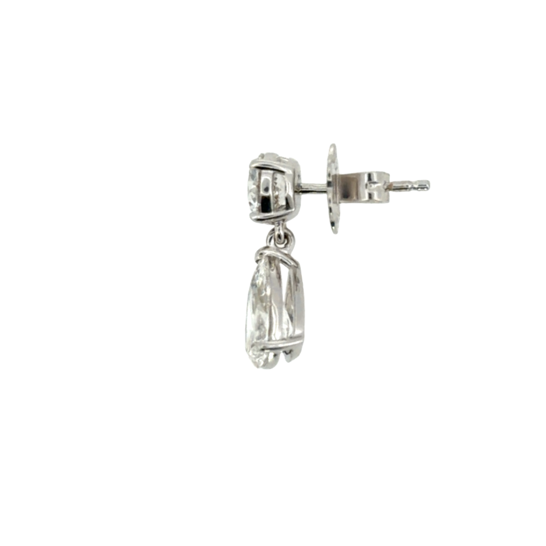 A sideways view of an earring with a stud and back on a white background.