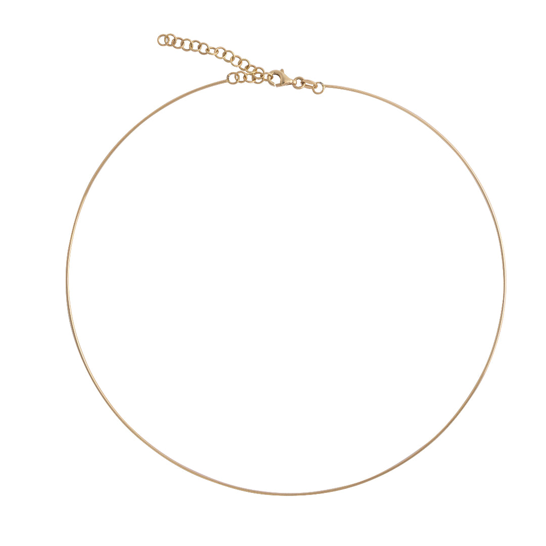 A gold thin wire collar on a white background.
