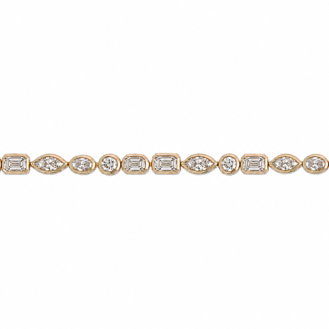 A tennis bracelet with lab-grown diamonds bezel set in 14k gold, featuring a marquis, oval, circle and emerald shaped diamonds.