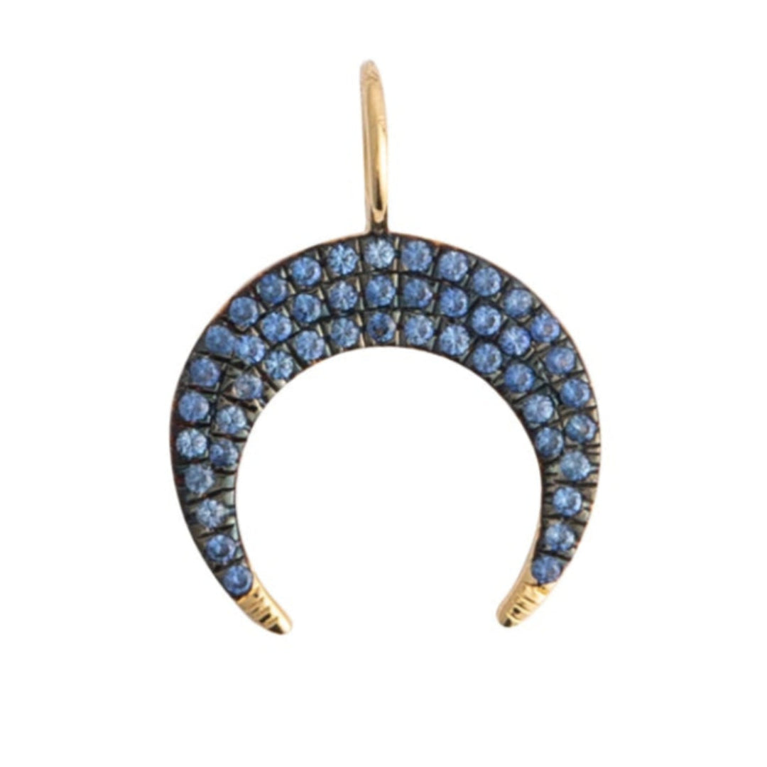Crescent moon-shaped pendant with blue sapphires on a white background