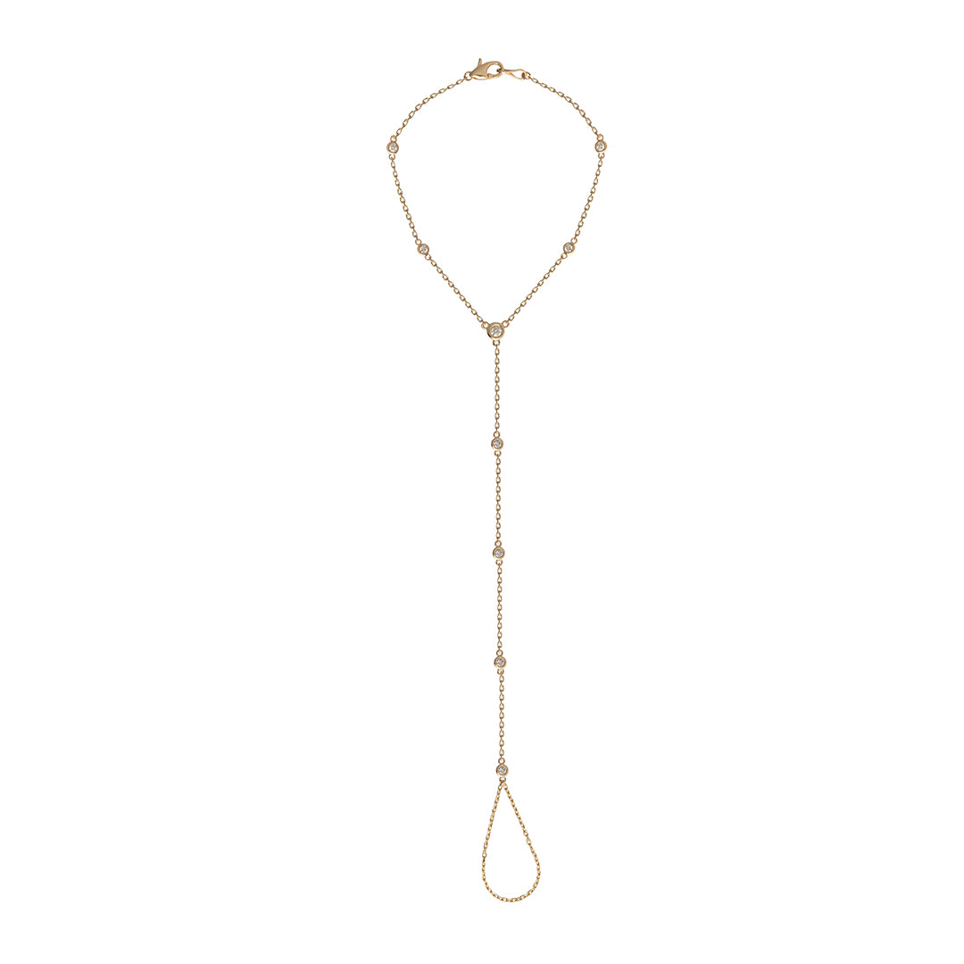Gold hand chain with station diamonds on a white background