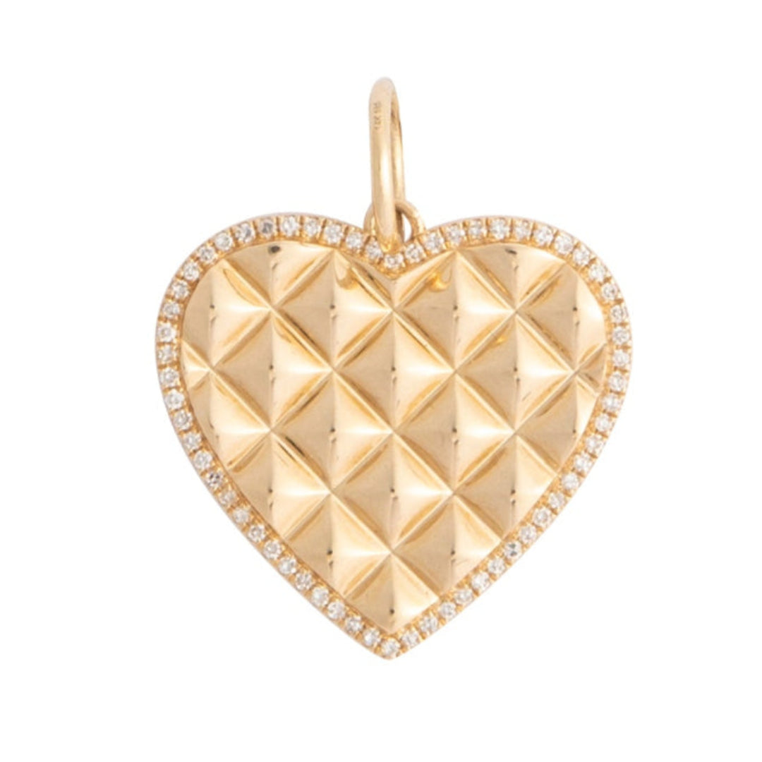 Gold heart-shaped pendant on a white background
