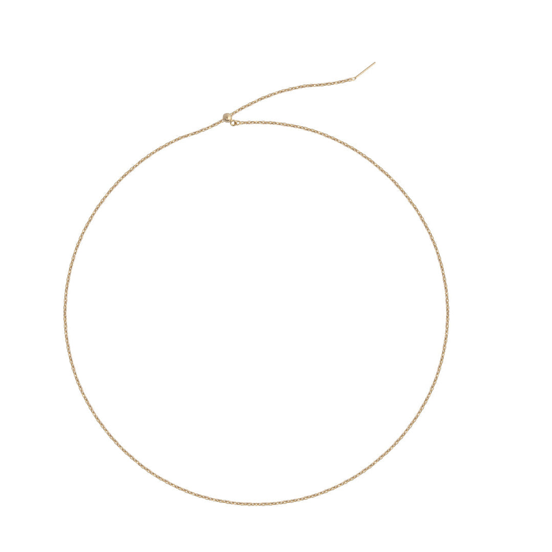 A gold mini link chain necklace with an adjustable closure, displayed on a white background.