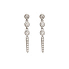 Pair of white gold stud earrings with diamonds on a white background. 