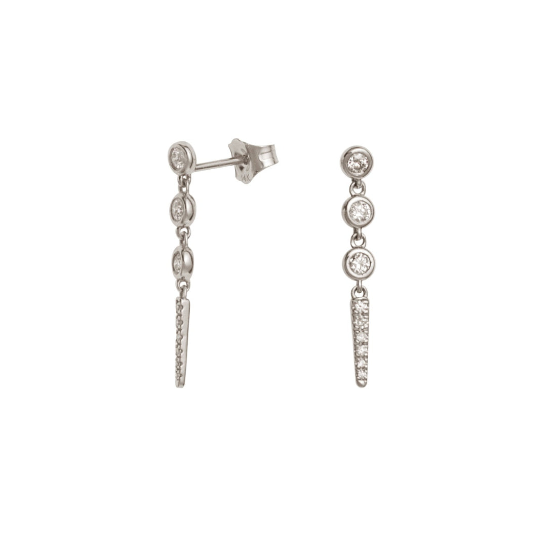Pair of white gold earrings with diamonds on a white background.