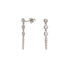 Pair of white gold earrings with diamonds on a white background.