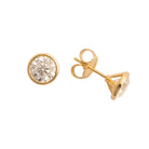 Gold stud earrings with diamonds gemstones on a white background
