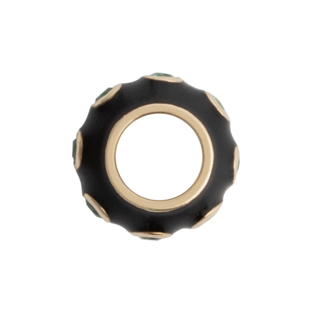 Black and gold bead on a white background