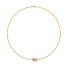 Gold chain necklace on a white background