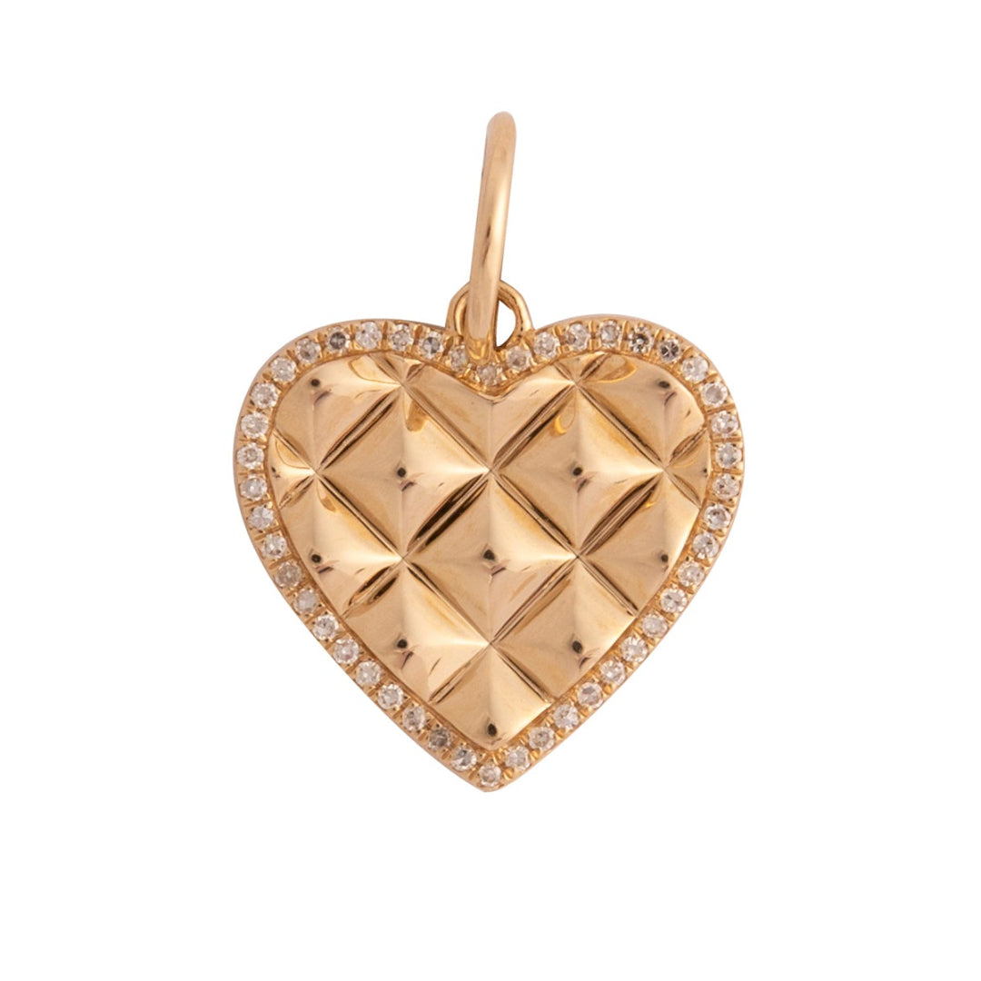 Gold heart-shaped pendant on a white background