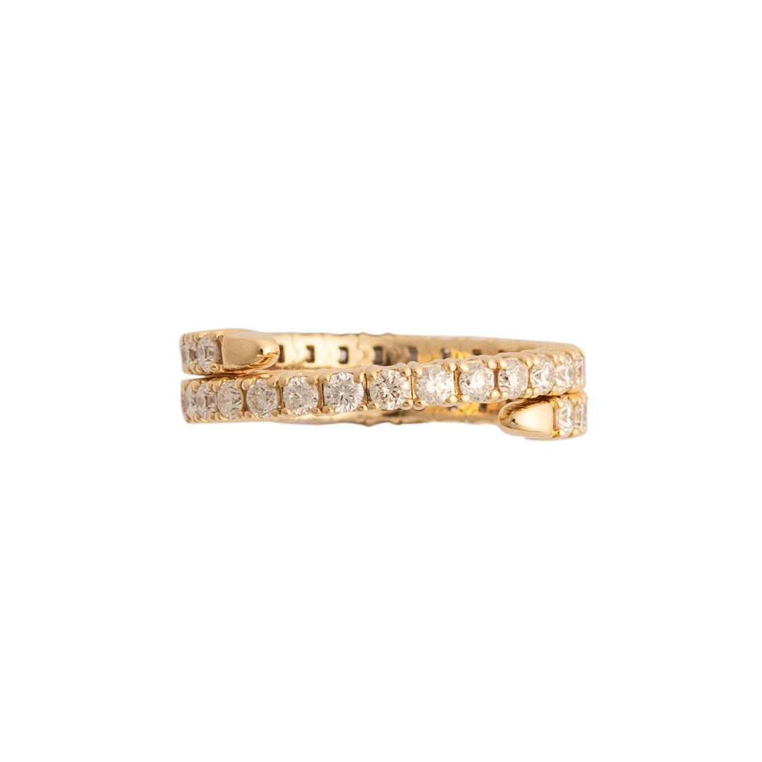Gold ring with diamonds on a white background.
