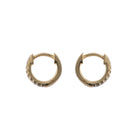Gold hoop earrings on a white background
