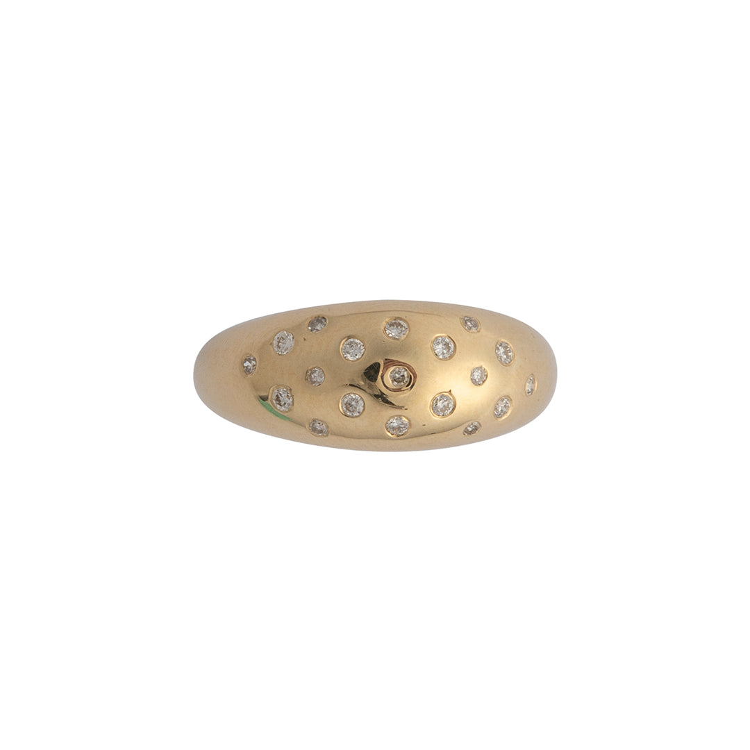 A 14k gold dome ring with embedded round diamonds, displayed against a plain background.