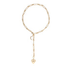 Gold chain necklace with crescent moon diamond pendant and a  heart and eye pendants on a white background