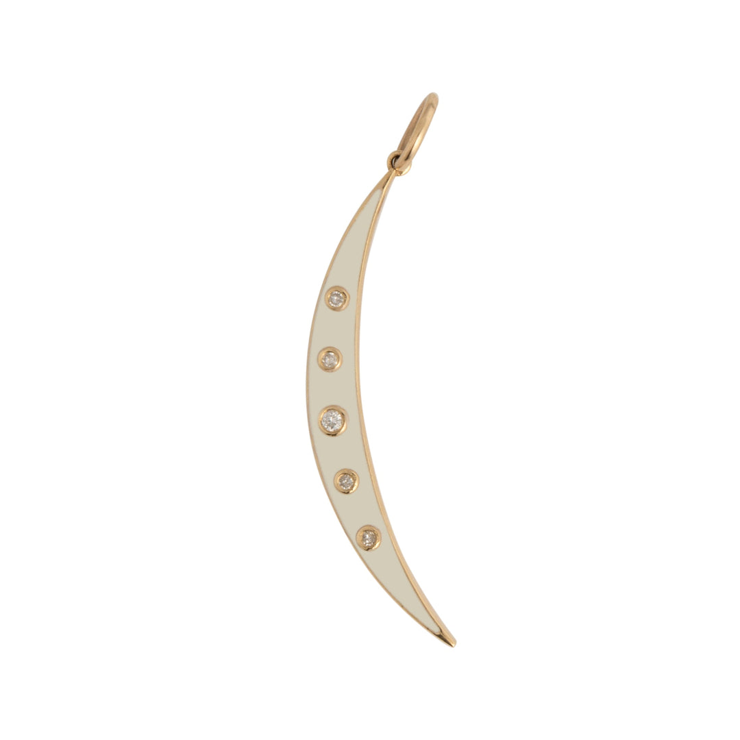 A gold crescent moon-shaped pendant with white enamel detailing and small diamonds around the edge.