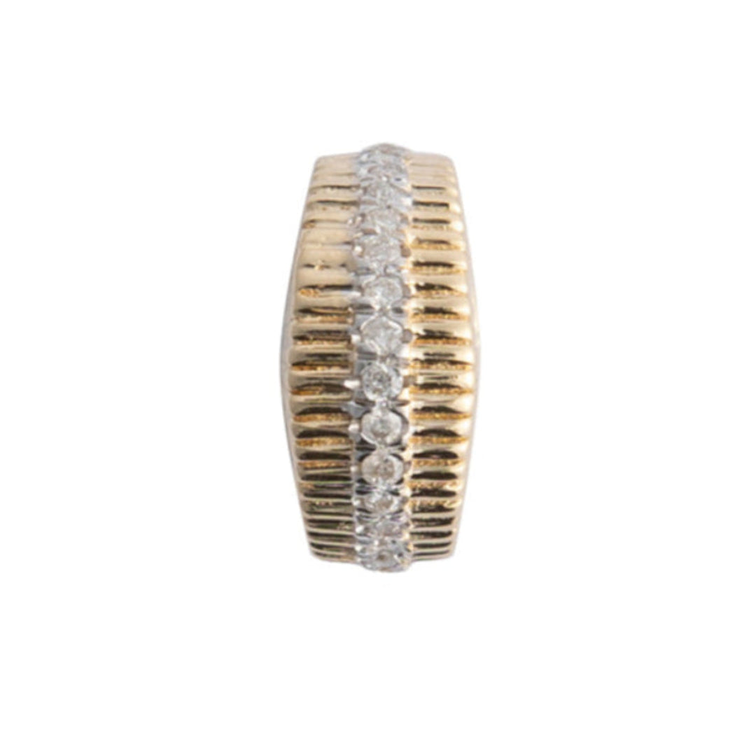 A curved edge diamond roundel bead made of 14k gold with a pattern of inset and prominent diamonds creating a roundel design.