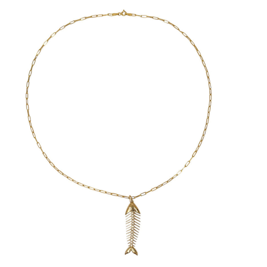 A 14k gold necklace with a fish pendant on a white background.