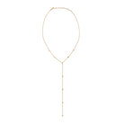 Gold lariat necklace with station set diamonds on a white background