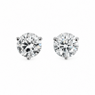 Lab-grown diamond studs set in white gold on a white background. 