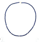 Natural lapis beaded necklace with 14k gold beads on a white background