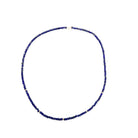 Natural lapis beaded necklace with 14k gold beads on a white background
