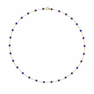 14k gold chain with lapis beads on a white background. 