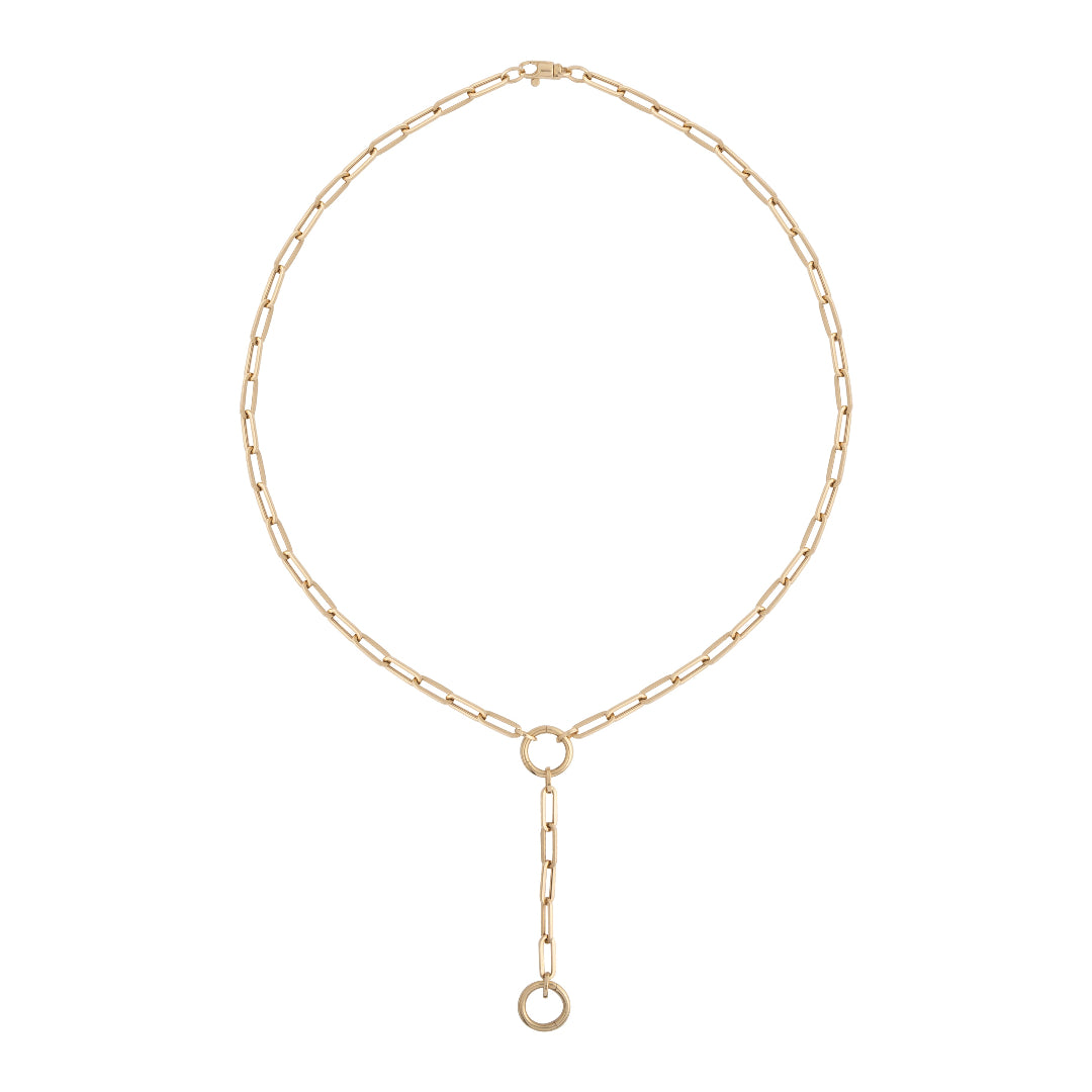 A 14k gold lariat paperclip chain necklace with a y-drop design and two rings for attaching pendants.
