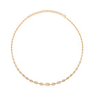 Gold necklace with marquis diamonds on a white background