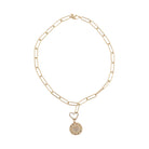 A white background with a 14k gold paperclip chain with a gold and diamond pendant bail attaching a Multi-Colored Sapphire and Diamond Heart Pendant. 
