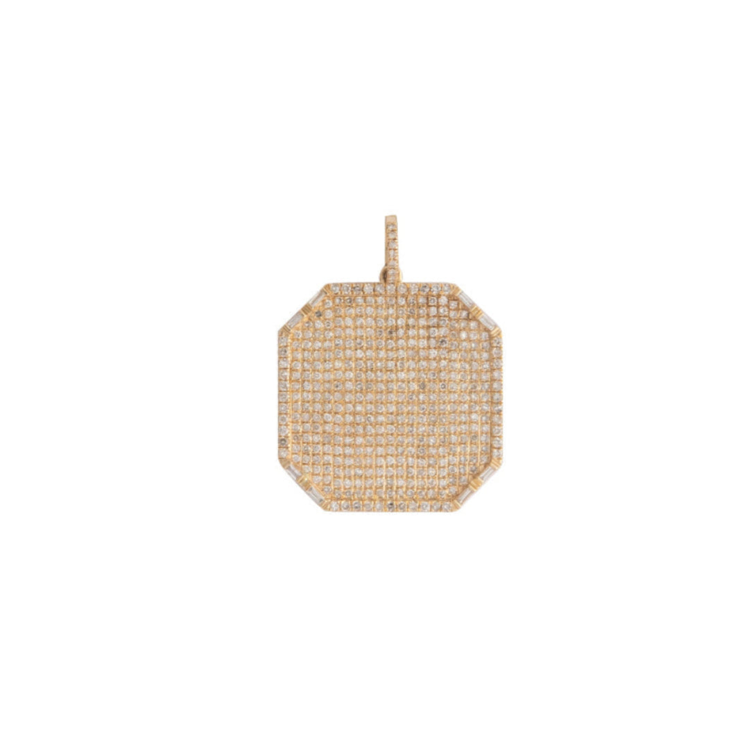 Gold and pave diamond pendant on a white background